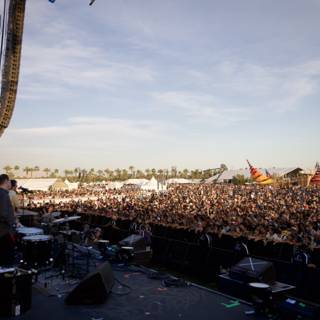 Coachella Crowd Rocking Out Under the Cloudy Sky