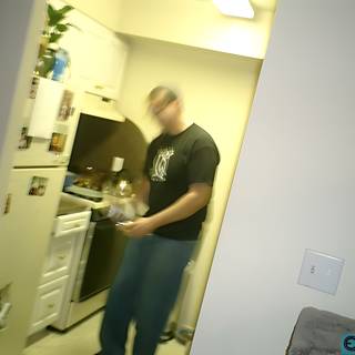 Blurry Portrait of a Man in his Kitchen