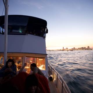 Boat ride at sunset with cityscape