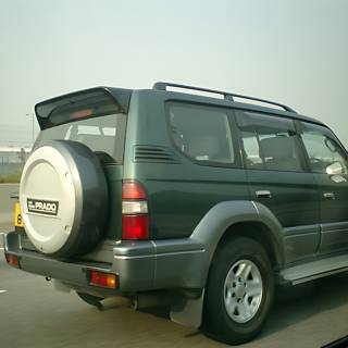Green SUV on the Highway