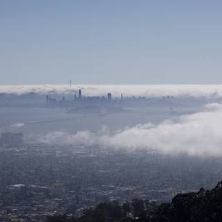 City Under the Clouds: A Spectacular Foggy Day View