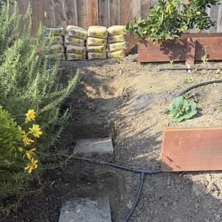 Backyard Garden Project with Soil Bags and Planter Beds