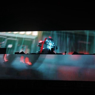 DJ Silhouette Framed by Massive LED Stage Visuals