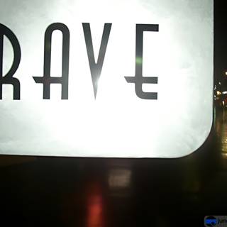 Neon Rave Sign Lights Up City Skyline