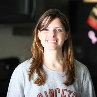 Smiling Woman in Princeton Sweatshirt at Home