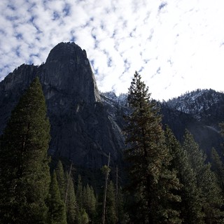 Sentinel Rock Rising Above Yosemite Valley Forest