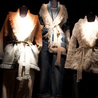 Luxurious Fur-Trimmed Winter Fashion Display on Mannequins