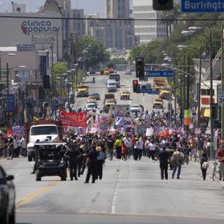 Mayday Rally Crowd Takes to the Streets of Metropolis
