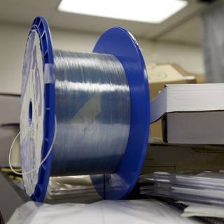 Blue and Clear Plastic Spool