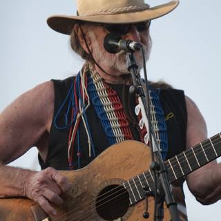 Willie Nelson Plays Under the Blue Sky with His Signature Cowboy Hat