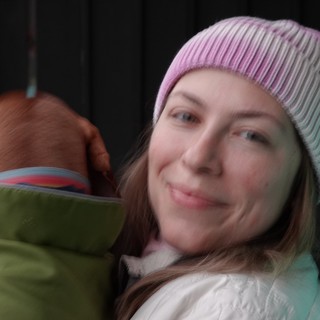 Woman in Colorful Beanie Enjoys Outdoor Winter Day