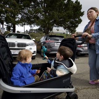 Family Outing with Kids in Wagon at Parking Lot