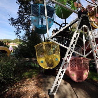 Colorful Ferris Wheel Gondolas at Fantasyland Theme Park
