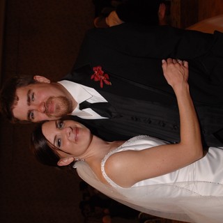 Newlyweds Share Tender Moment at Wedding Reception
