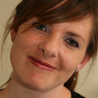 Penelope: Warm Portrait with Playful Smile