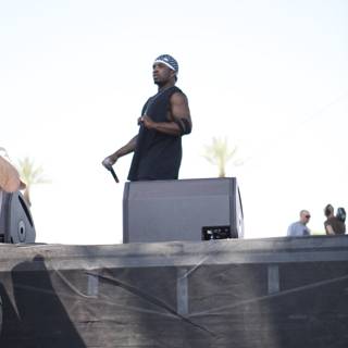 Man addressing the crowd at Coachella Sunday
