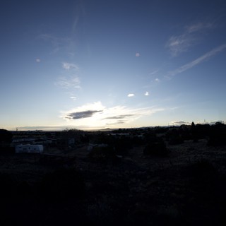 Twilight Over a Silhouetted Rural Township