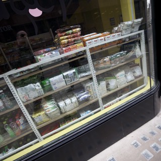 Convenience Store Refrigerated Display Window at Night