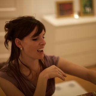 Candid Moment of Joy at an Art Gallery