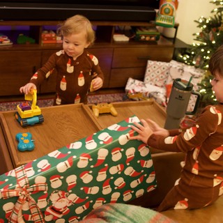 Christmas Morning Joy with Matching Pajamas and Presents