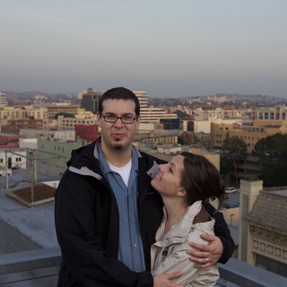 Rooftop Romance Above the City at Dusk