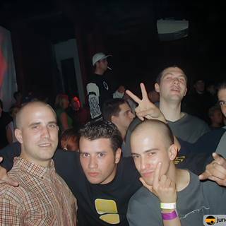 Group of Men Having Fun at a Nightclub Party