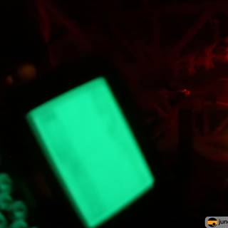 Green Light Illuminates Computer Screen