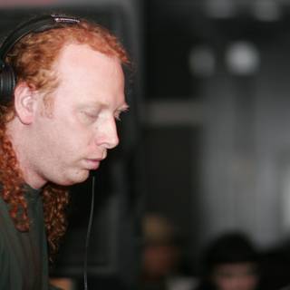 Red-haired Man Grooving to 2006 Funktion Viram