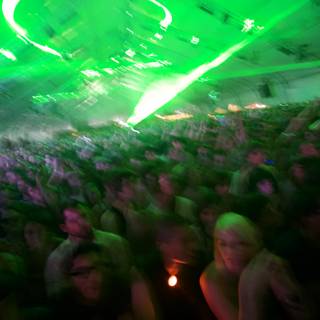 Green-Lit Concert Crowd