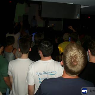 Night Club Crowd Watching DJ