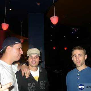 Three Men Enjoying a Night Out at the Bar