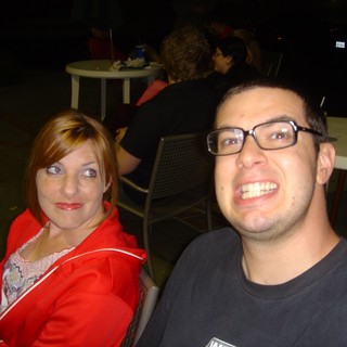 Friends Making Silly Faces at Night Outing
