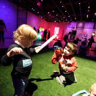 Children Playing at Baby Rave Light Installation