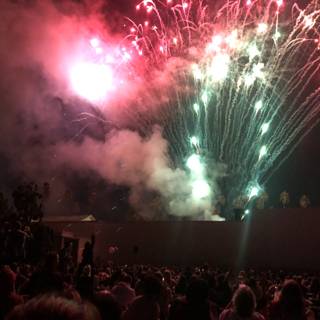Explosive Sky over the Concert Crowd