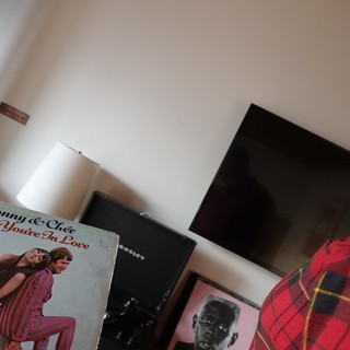 Man Showing Vintage Sonny & Cher Album