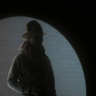 Silhouette of a Man in a Sun Hat