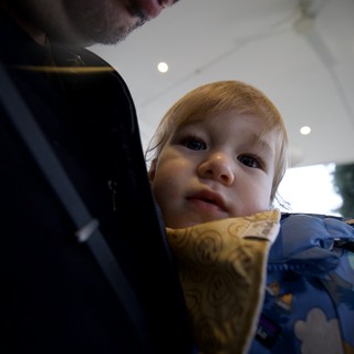 Father and Young Child Share Intimate Moment Indoors