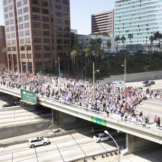 Mayday Rally: A Sea of People on a City Bridge