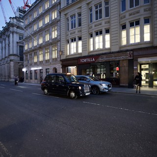 Evening Traffic on London Street at Twilight