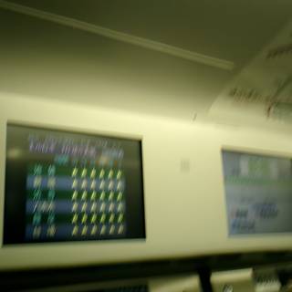 Blurry Train Station Monitors