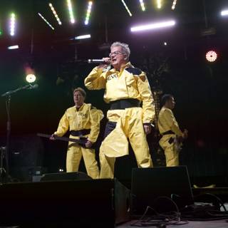 Yellow-suited Man Rocks Coachella Stage with Bandmates