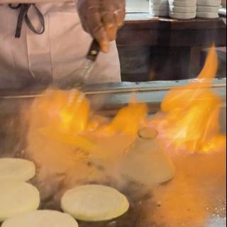 Flaming Grill Master at Work