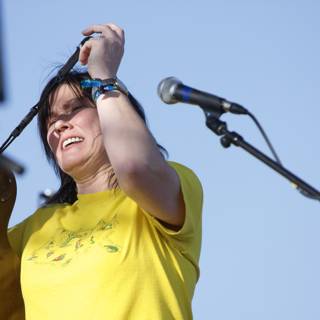 Kim Deal Rocks Coachella with Guitar and Microphone