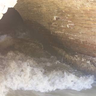 Brick Tunnel with Flowing Water