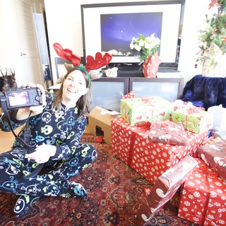Joyful Christmas Morning in Reindeer Antlers and Skull Pajamas