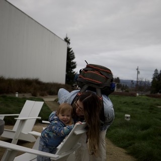 Mother and Child Moment at Outdoor Dining Area