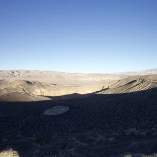 Majestic Mountains Meet Endless Desert Plateau