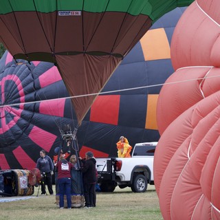 Ground Crew Prepares Hot Air Balloons for Launch