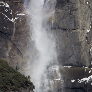 Yosemite Falls Cascading Through Winter Mist and Snow