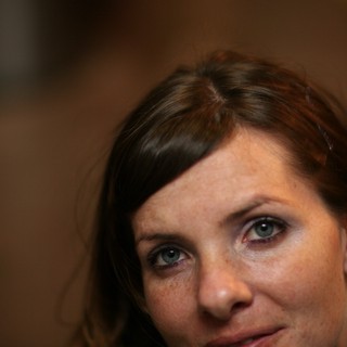Penelope: Intimate Portrait with Striking Blue Eyes